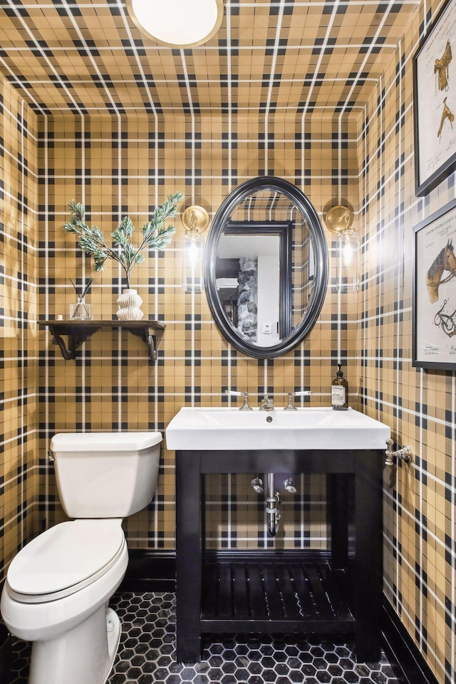 bathroom with tile patterned floors and toilet