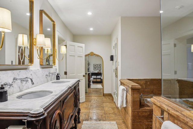 bathroom with vanity and backsplash