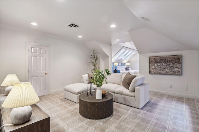 living room featuring lofted ceiling