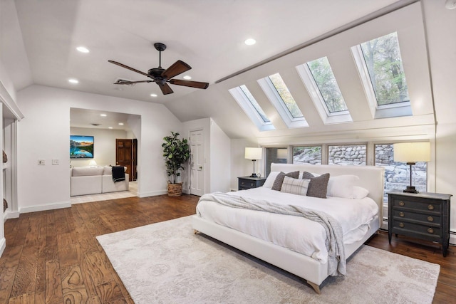 bedroom featuring lofted ceiling, dark hardwood / wood-style floors, and ceiling fan