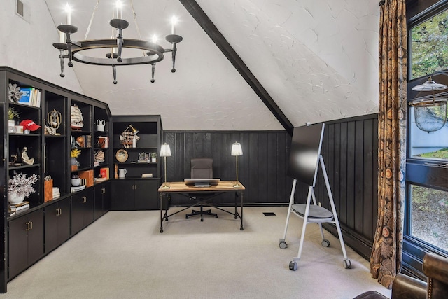 office area with wooden walls, vaulted ceiling with beams, carpet flooring, and a chandelier