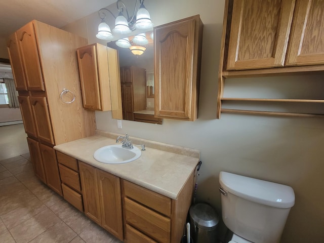 5330 500th St, Kenyon Twp, MN 55946 - bathroom with vanity, tile patterned floors, and a baseboard radiator