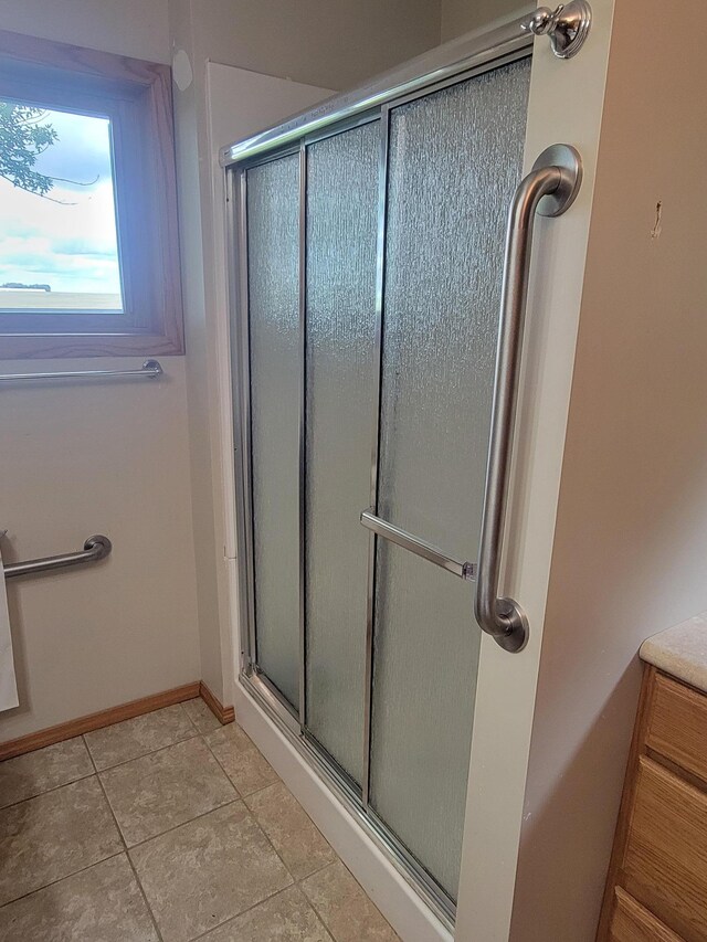 5330 500th St, Kenyon Twp, MN 55946 - bathroom with a shower stall and baseboards