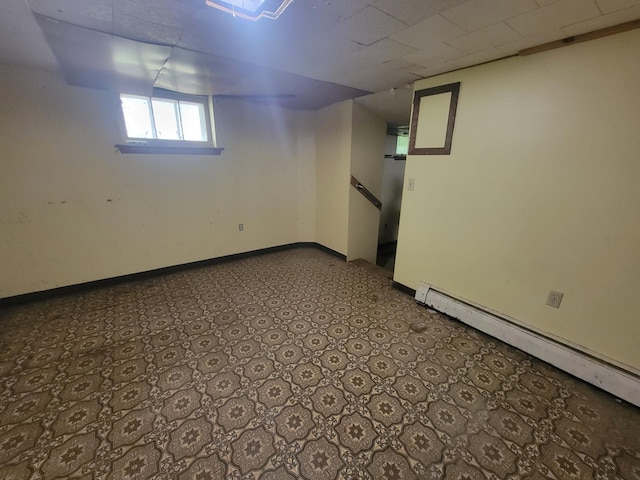 5330 500th St, Kenyon Twp, MN 55946 - below grade area with a baseboard radiator and baseboards