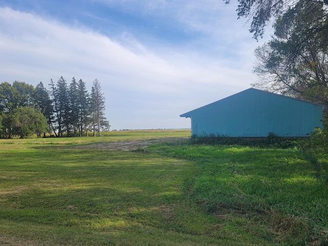 5330 500th St, Kenyon Twp, MN 55946 - view of grassy yard featuring an outbuilding, an outdoor structure, and a rural view
