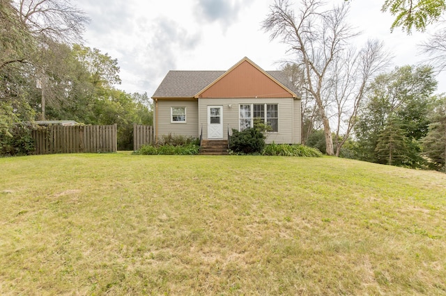 view of front of home featuring a front lawn