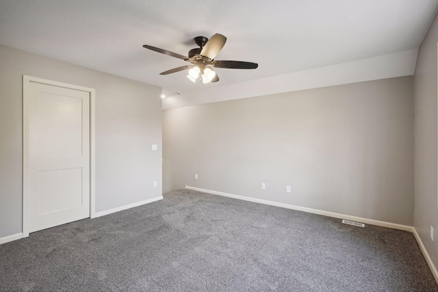 unfurnished room with carpet and ceiling fan