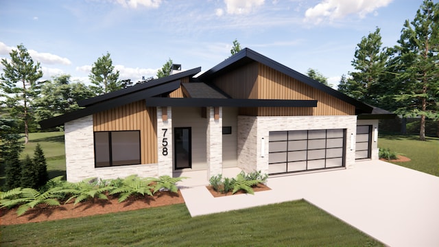 contemporary house featuring a garage and a front yard