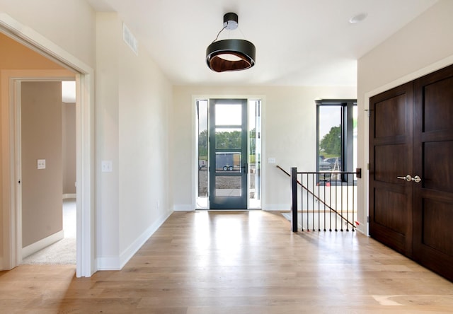 foyer entrance featuring light wood-type flooring