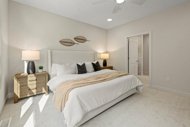 bedroom featuring light carpet and ceiling fan