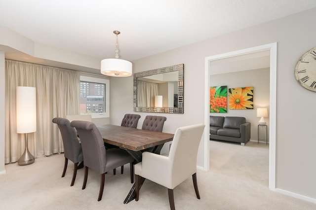 view of carpeted dining room