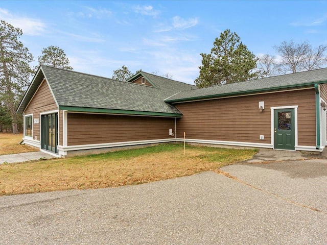 exterior space with a lawn