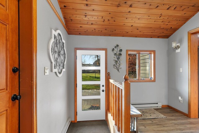 foyer with a baseboard heating unit, light hardwood / wood-style flooring, lofted ceiling, and wooden ceiling