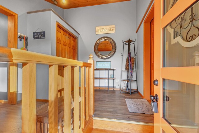 hallway with light hardwood / wood-style floors