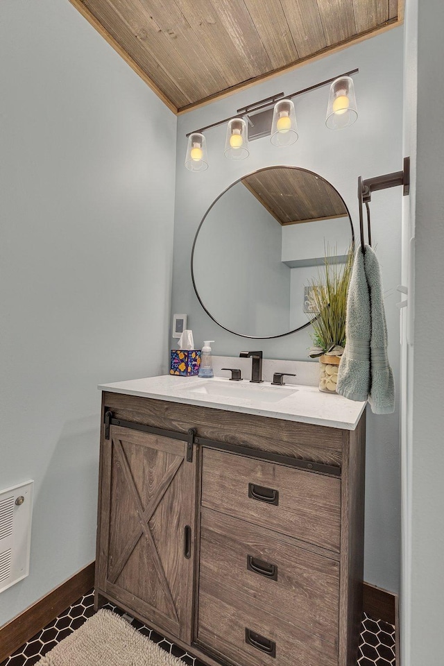 16568 Maplewood Rd, Wakefield Twp, MN 56320 - bathroom featuring vanity and baseboards
