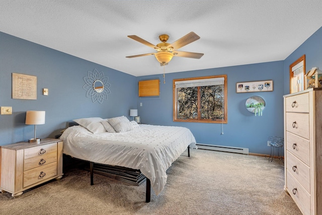 16568 Maplewood Rd, Wakefield Twp, MN 56320 - carpeted bedroom with baseboard heating, a ceiling fan, a textured ceiling, and baseboards