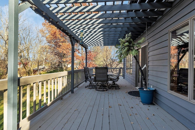 16568 Maplewood Rd, Wakefield Twp, MN 56320 - wooden deck featuring outdoor dining area and a pergola