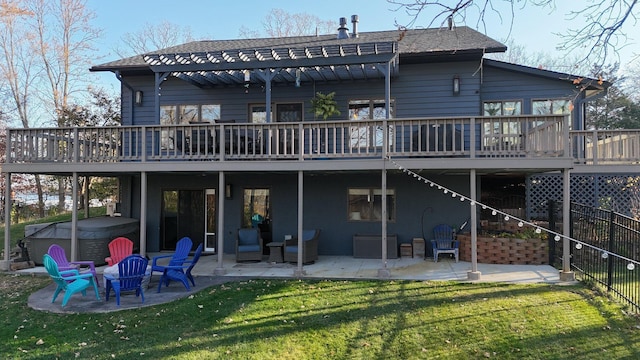 16568 Maplewood Rd, Wakefield Twp, MN 56320 - rear view of house featuring a hot tub, a deck, a patio area, and a yard