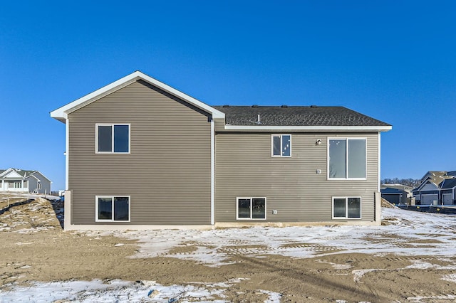 view of snow covered house