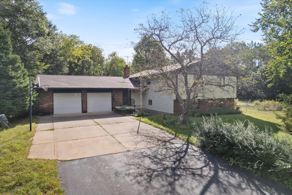 ranch-style home with a garage