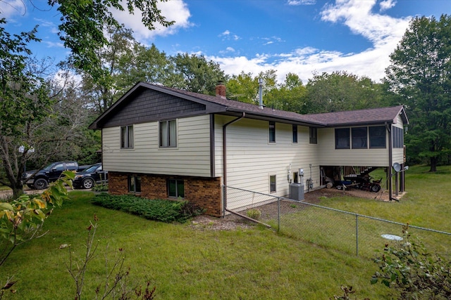 view of home's exterior featuring a lawn