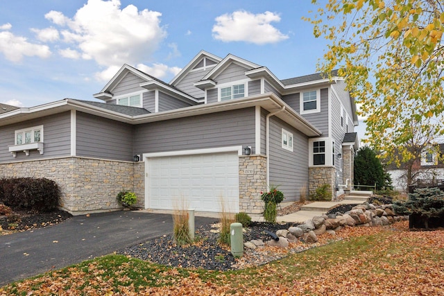 craftsman-style home featuring a garage