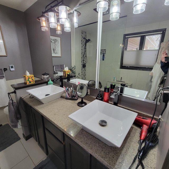 bathroom featuring tile patterned floors and vanity