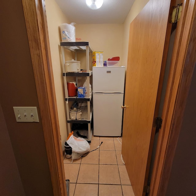 washroom featuring light tile patterned flooring