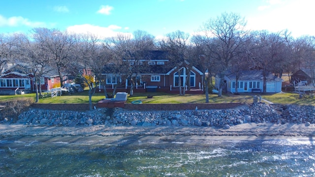 view of front of home with a front yard