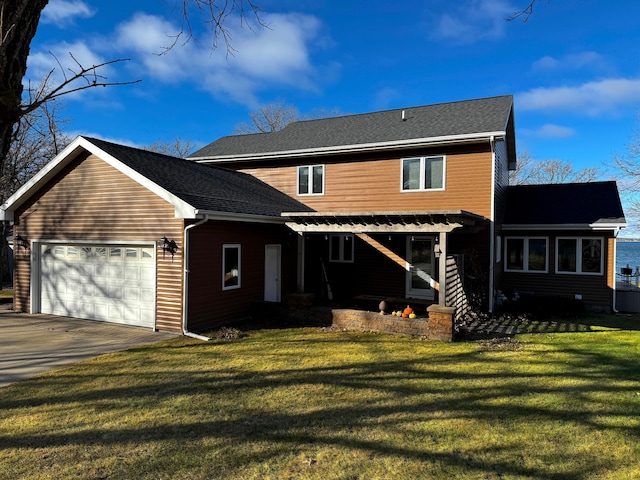 view of front of property with a porch, a garage, and a front lawn