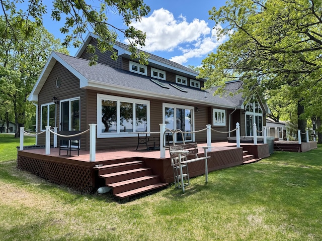 145 Bay View Rd, Ottertail, MN 56571 - rear view of property with a shingled roof, a yard, and a deck