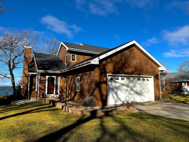 145 Bay View Rd, Ottertail, MN 56571 - view of front facade featuring driveway, a chimney, an attached garage, and a front lawn
