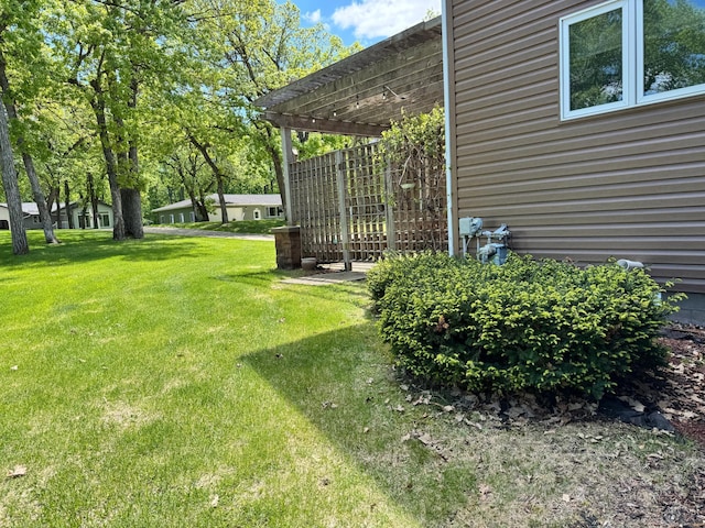 145 Bay View Rd, Ottertail, MN 56571 - view of green lawn featuring a pergola