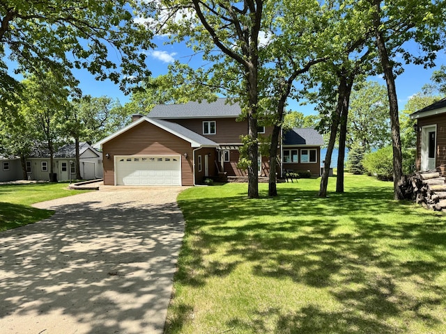 145 Bay View Rd, Ottertail, MN 56571 - traditional-style home featuring a garage, driveway, and a front yard