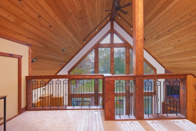 interior details with wood ceiling, carpet, and ceiling fan