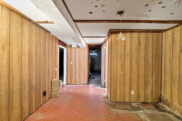 interior space featuring wood walls