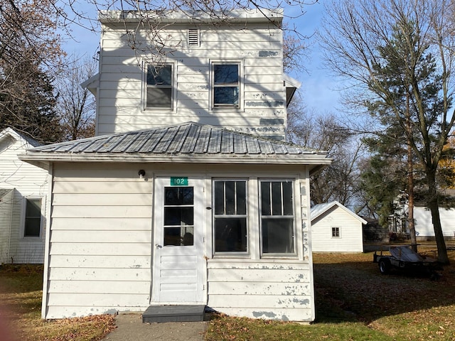 exterior space featuring metal roof