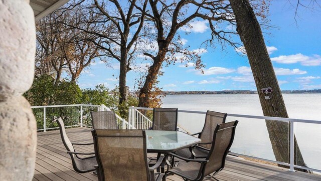 11470 Forada Beach Rd SE, Alexandria, MN 56308 - wooden terrace featuring a water view and outdoor dining space