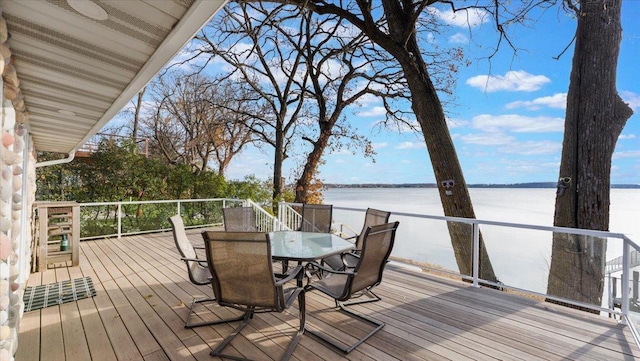 11470 Forada Beach Rd SE, Alexandria, MN 56308 - wooden deck with a water view and outdoor dining area