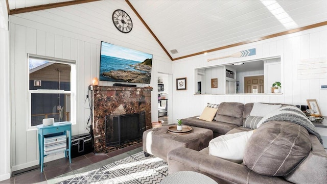 11470 Forada Beach Rd SE, Alexandria, MN 56308 - living room featuring a premium fireplace, tile patterned floors, vaulted ceiling, and wood walls