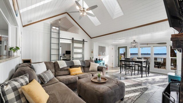 11470 Forada Beach Rd SE, Alexandria, MN 56308 - living area featuring a barn door, high vaulted ceiling, a ceiling fan, a skylight, and visible vents