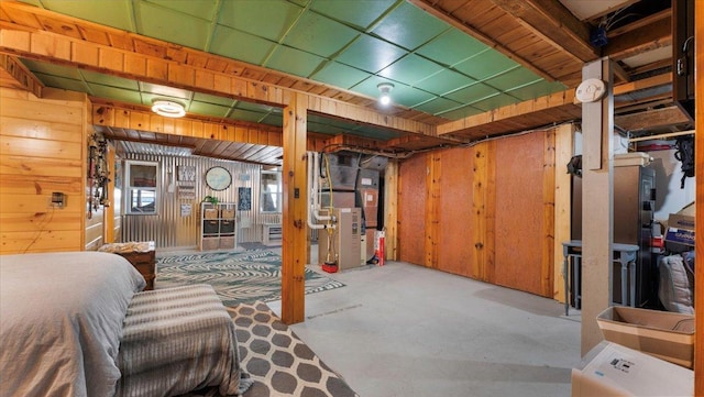 11470 Forada Beach Rd SE, Alexandria, MN 56308 - basement featuring heating unit and wooden walls