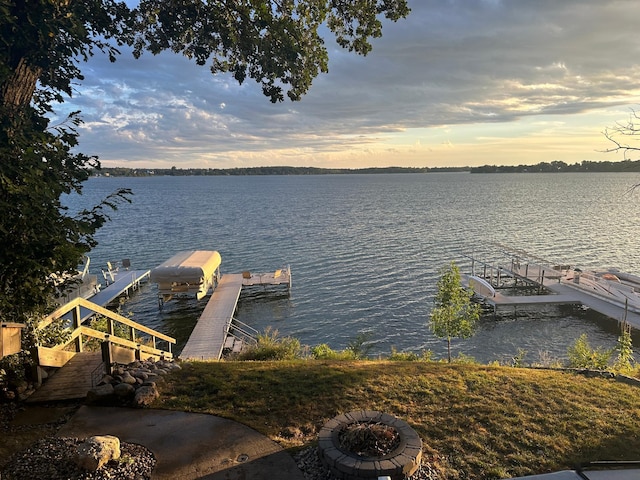 11470 Forada Beach Rd SE, Alexandria, MN 56308 - dock area with a water view, boat lift, and an outdoor fire pit