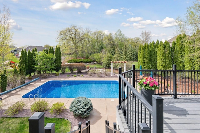 view of pool with a fenced in pool