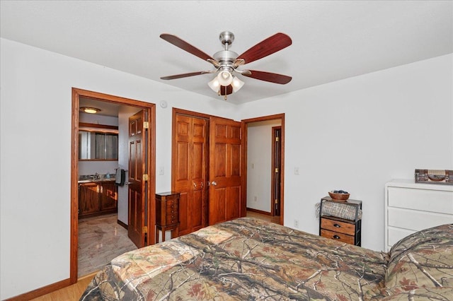 bedroom featuring a closet, ceiling fan, and light hardwood / wood-style flooring