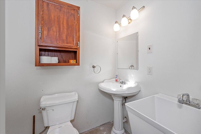 bathroom featuring sink and toilet