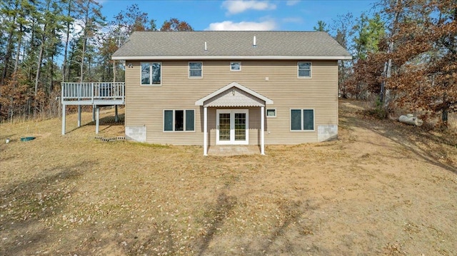 back of property featuring a deck