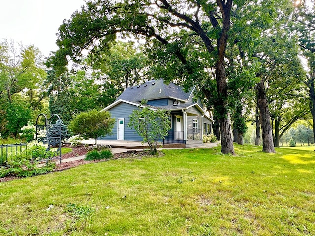 exterior space with a front yard