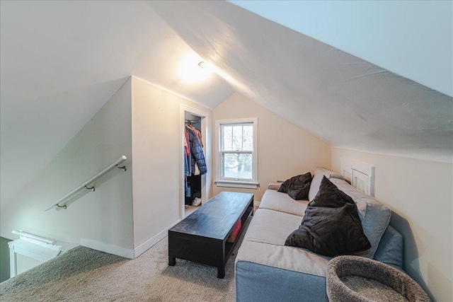 living room featuring carpet and vaulted ceiling