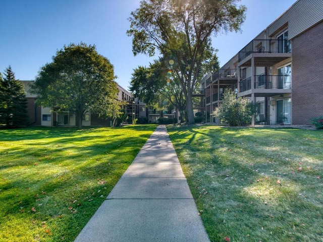 view of community featuring a lawn